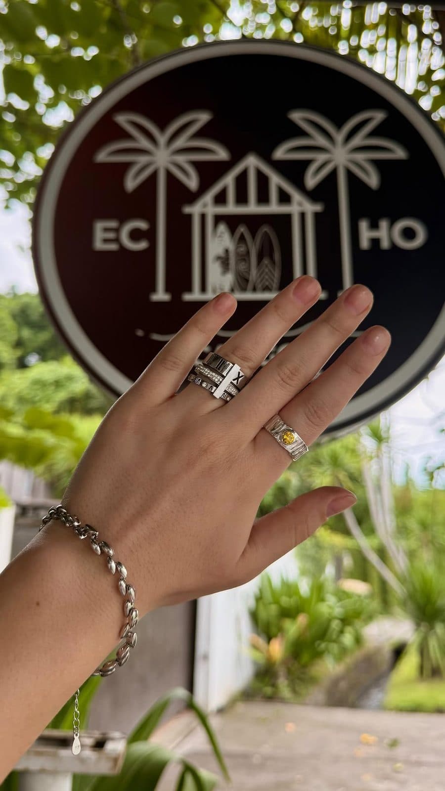 Student showing the silver rings she made at the Echo Silver Canggu silver class